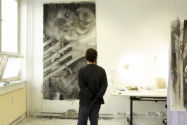 open studio 2025-10: artist infront of drawing 